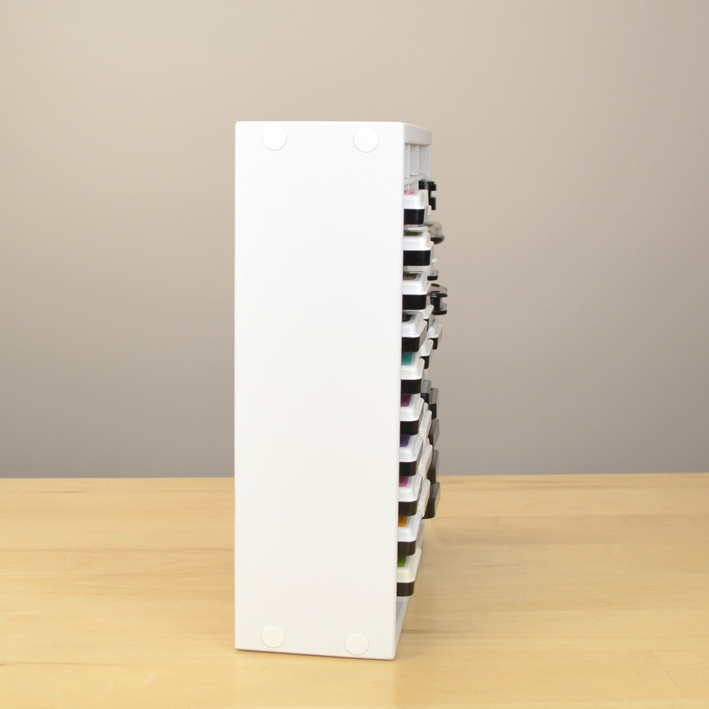 Side view of an ink pad organizer showing how far the pads stick out the front.