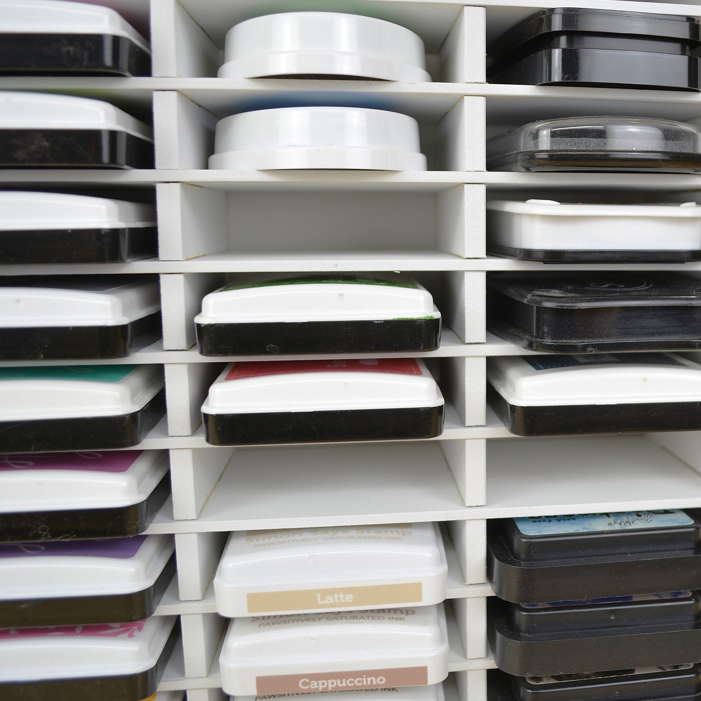 Closeup view of Catherine Pooler and Simon Says Stamp ink pads in an OrganizeMore organizer.