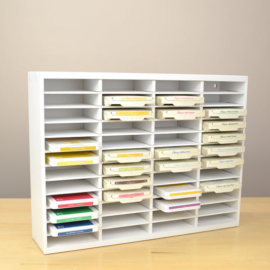 Angle view of a full 48 Ink Pad organizer for Stampin Up, painted white and built by OrganizeMore.