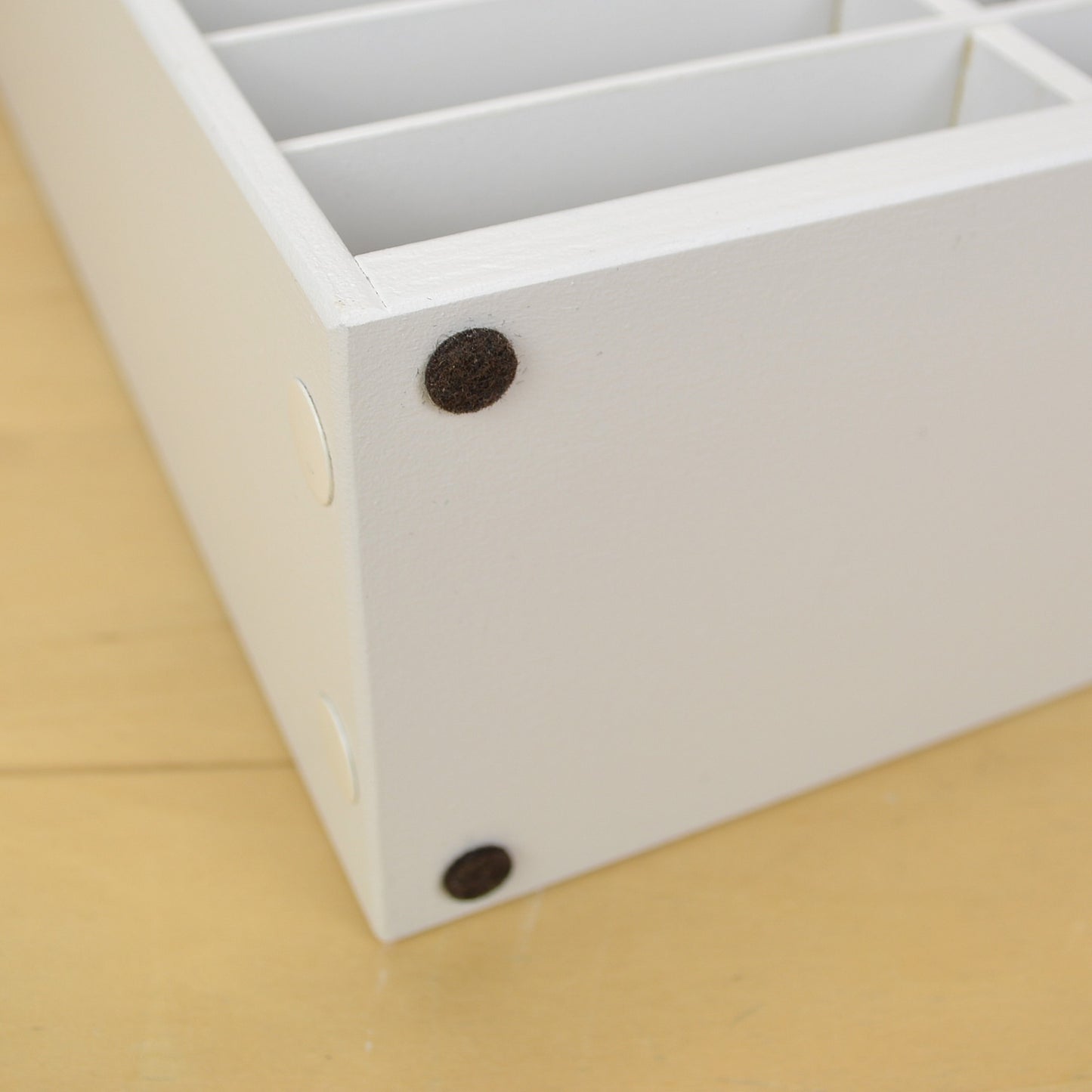 Closeup view of the felt pads on the bottom of OrganizeMore ink pad organizers.