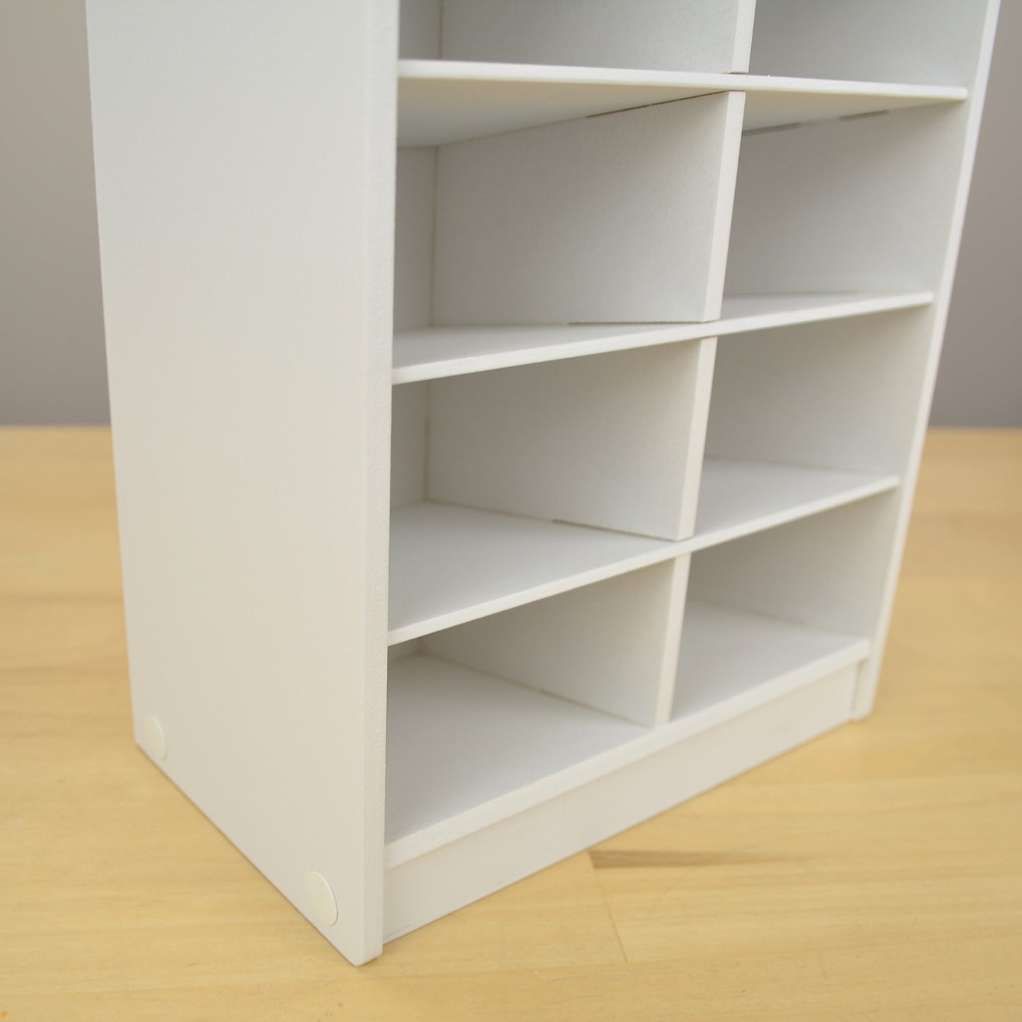 Detail showing the marker organizer cubbies with slanted shelves.