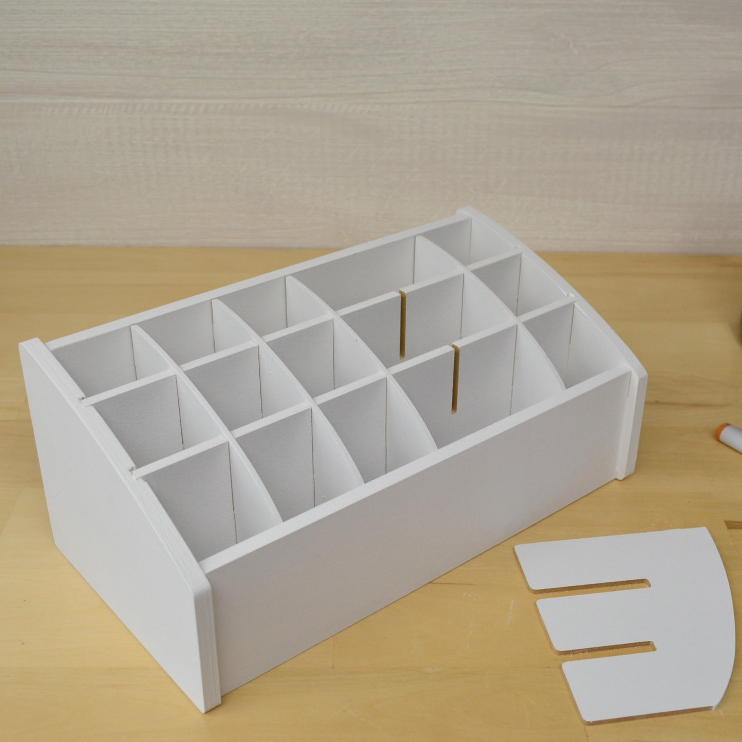 empty white caddy for crafting tools with one divider removed showing versatility of the cubbies