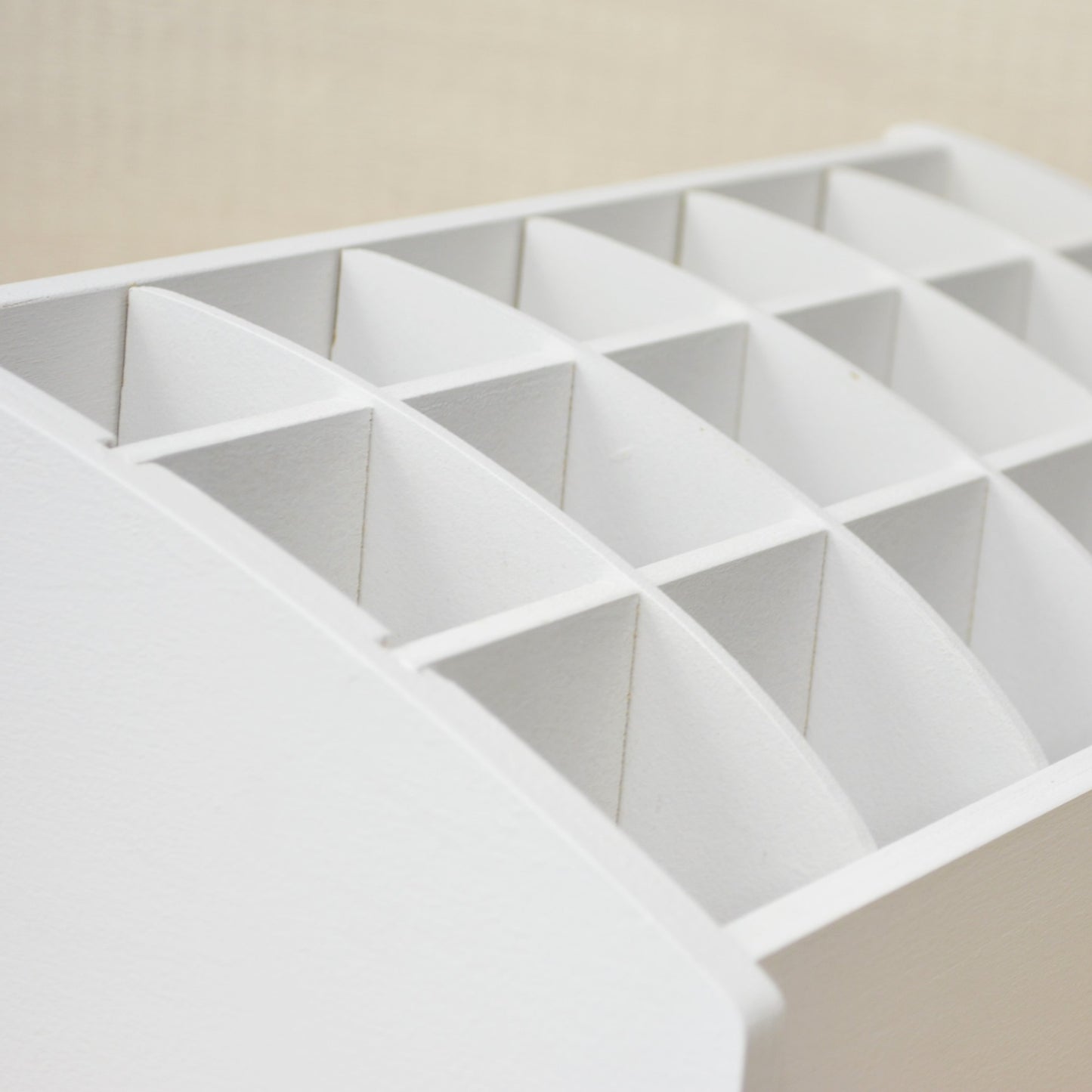closeup of the arched top design on dividers in a crafting tool caddy
