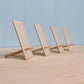 Side view of four card easels. 