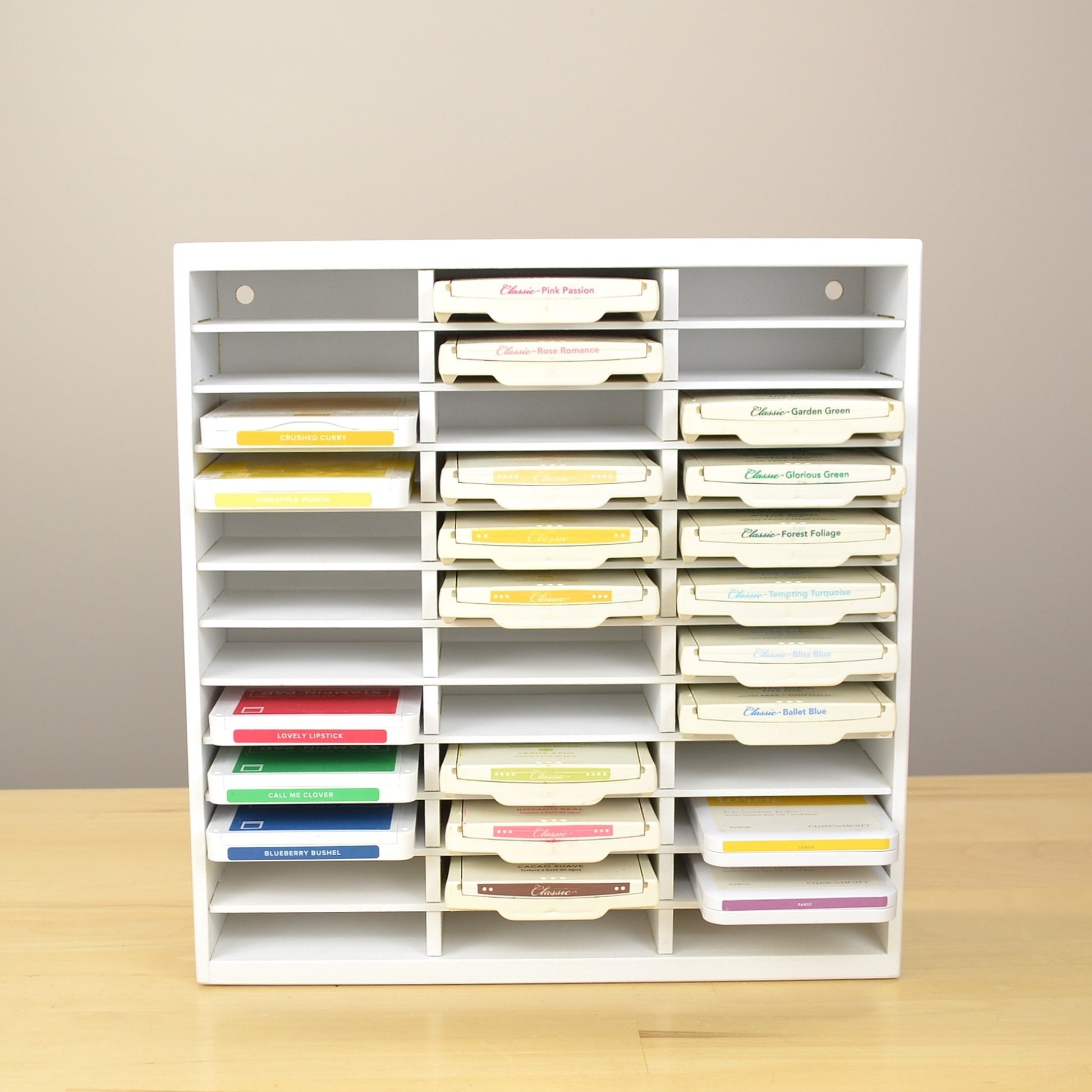Direct view of the 36 Ink Pad organizer holding Stampin Up and CTMH pads. 