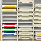 Closeup view of Stampin Up ink pads in a white storage organizer. 