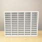 Front view of a 60 slot ink pad holder painted white. 