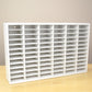 A white storage organizer made to hold 72 ink pads. 