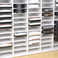 Closeup view of ink pads in a white craft organizer that has 72 slots. 