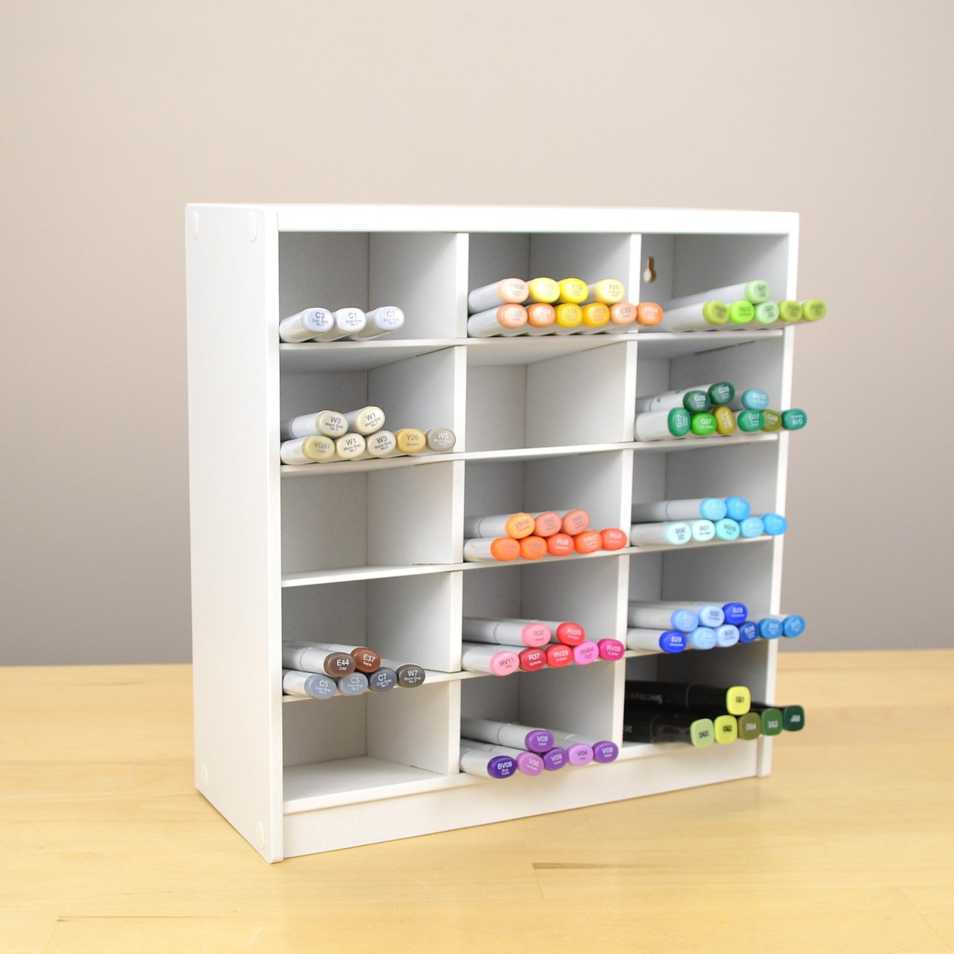 A white Pro Marker Organizer for Copics, made by OrganizeMore. 