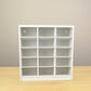 Detailed view of a white 15 cubby craft organizer. 