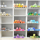 Front view of colorful markers in a white organizer by OrganizeMore. 