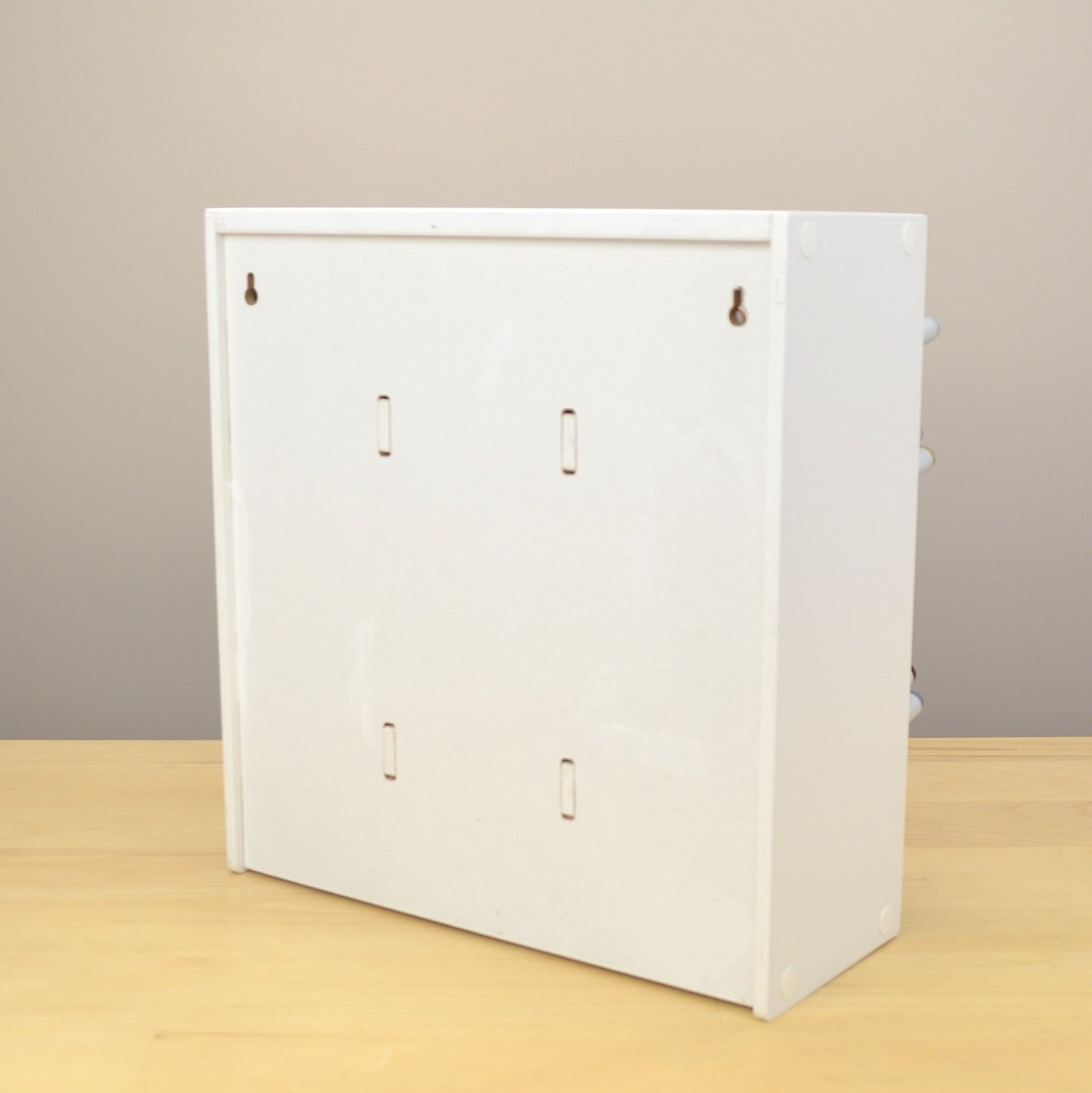 Back view of the Pro Marker Organizer showing the holes for wall mounting. 