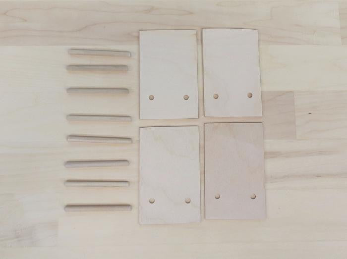 flat wooden easels to hold cards with seperate pegs for support